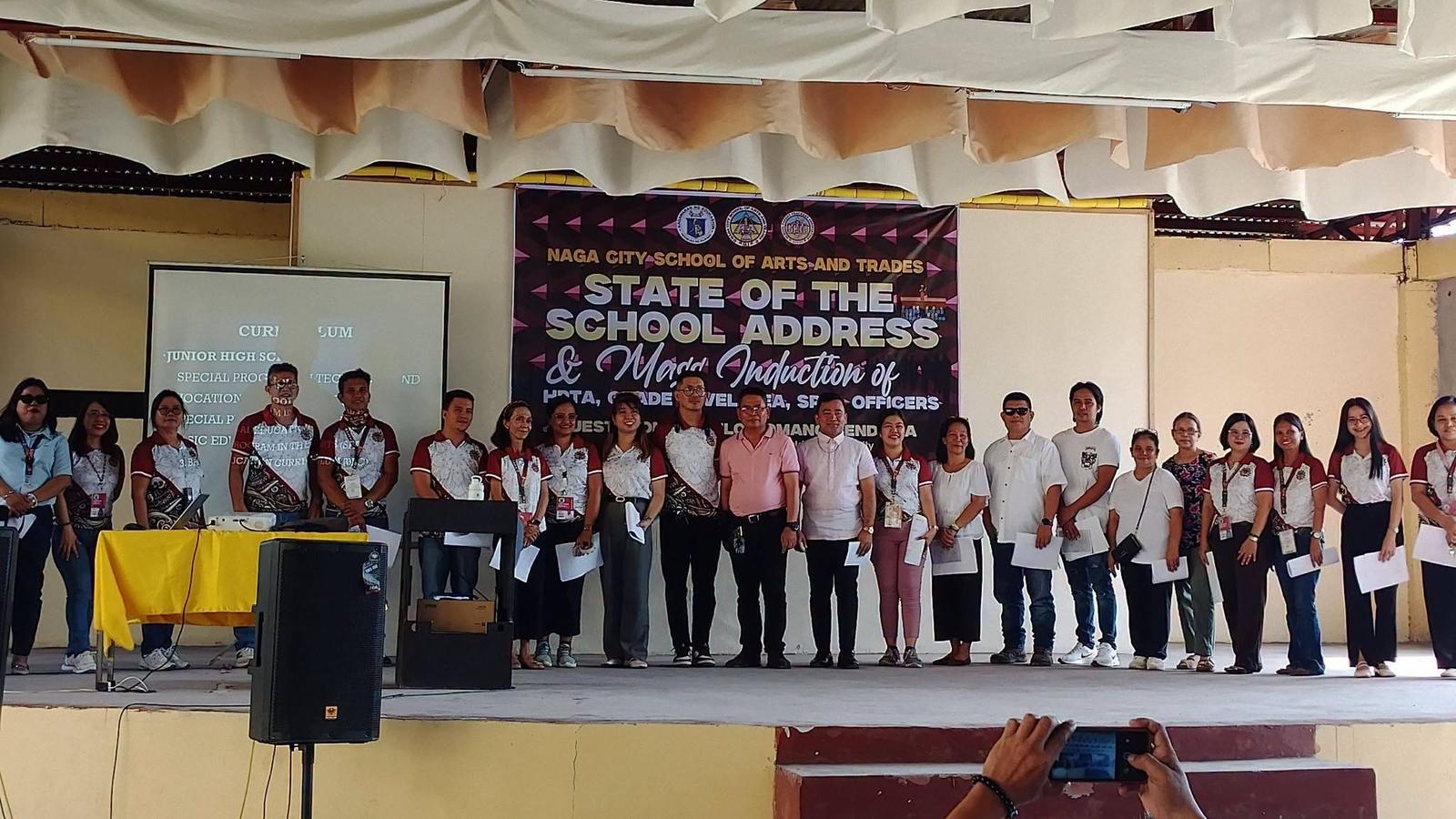 Faculty and staff at the State of the School Address